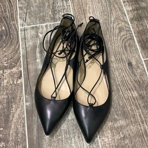 Black leather tie up flats